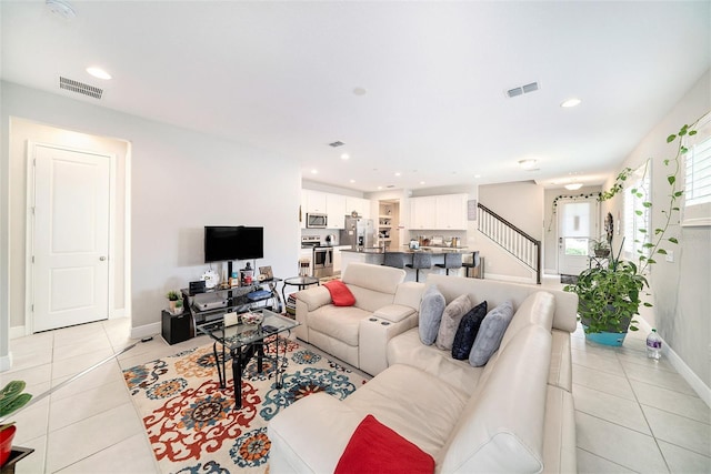 2101 Sunset Wind Loop, Oldsmar, FL 34677 - living area with light tile patterned floors and recessed lighting