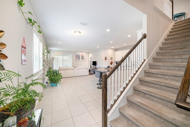 2101 Sunset Wind Loop, Oldsmar, FL 34677 - stairs with tile patterned floors and recessed lighting