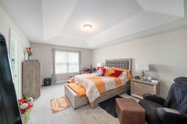 2101 Sunset Wind Loop, Oldsmar, FL 34677 - carpeted bedroom featuring a raised ceiling and baseboards
