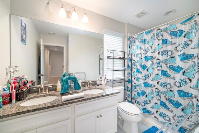 2101 Sunset Wind Loop, Oldsmar, FL 34677 - full bathroom with double vanity and a shower with shower curtain