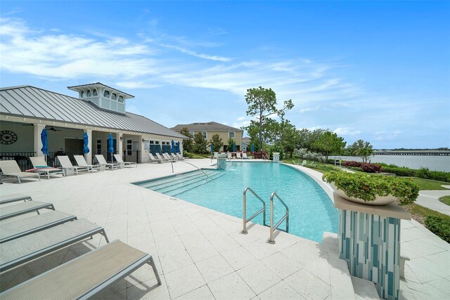 2101 Sunset Wind Loop, Oldsmar, FL 34677 - community pool featuring a patio area and a ceiling fan