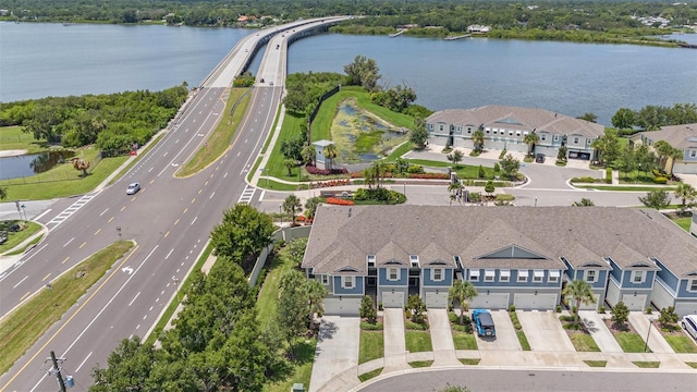 2101 Sunset Wind Loop, Oldsmar, FL 34677 - aerial view of residential area with a highway and a nearby body of water