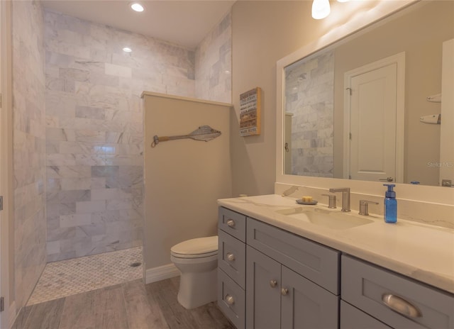 9016 Falcon Ct, Venice, FL 34293 - full bath with a walk in shower, vanity, wood finished floors, and recessed lighting