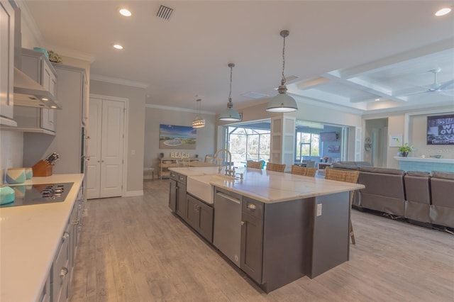 9016 Falcon Ct, Venice, FL 34293 - kitchen featuring dishwasher, black electric cooktop, recessed lighting, light wood-style flooring, and open floor plan