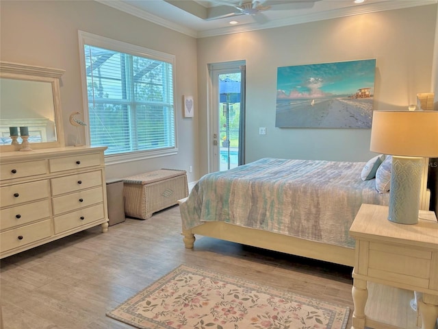 9016 Falcon Ct, Venice, FL 34293 - bedroom with access to outside, ornamental molding, wood finished floors, and recessed lighting