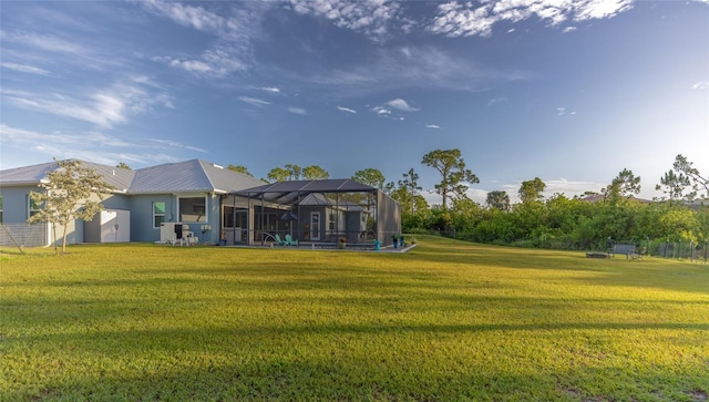 9016 Falcon Ct, Venice, FL 34293 - view of green lawn with a lanai