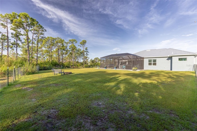 9016 Falcon Ct, Venice, FL 34293 - view of green lawn with glass enclosure