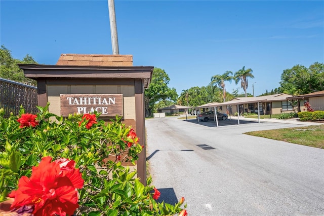 1980 Tahitian Pl Unit 10, Dunedin, FL 34698 - community sign featuring covered parking