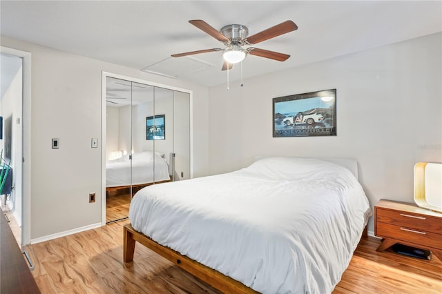 1980 Tahitian Pl Unit 10, Dunedin, FL 34698 - bedroom with light wood-style floors, a closet, and ceiling fan