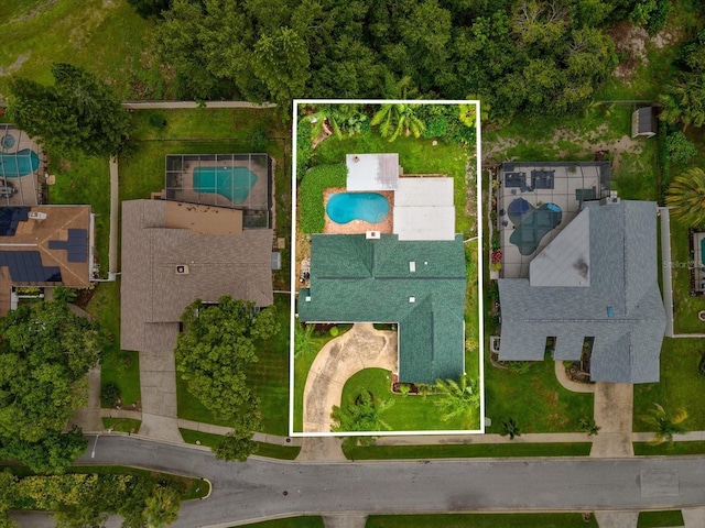 5110 Lake Valencia Blvd E, Palm Harbor, FL 34684 - aerial view of property and surrounding area featuring a pool area and property parcel outlined