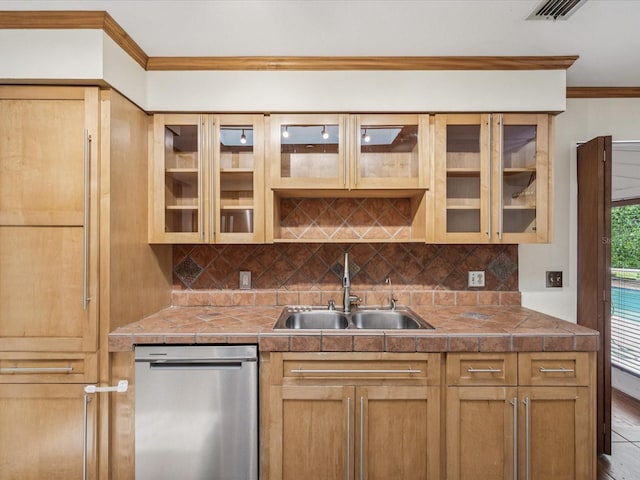 5110 Lake Valencia Blvd E, Palm Harbor, FL 34684 - kitchen featuring dishwasher, backsplash, ornamental molding, and glass insert cabinets