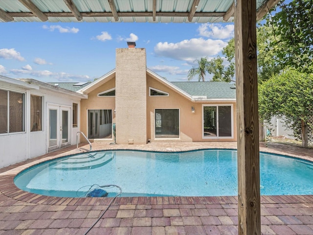 5110 Lake Valencia Blvd E, Palm Harbor, FL 34684 - view of pool with french doors and a patio