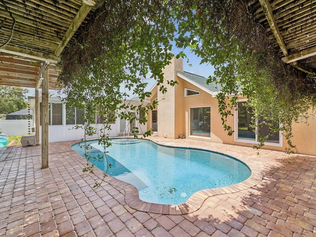 5110 Lake Valencia Blvd E, Palm Harbor, FL 34684 - view of swimming pool with a patio area and a sunroom
