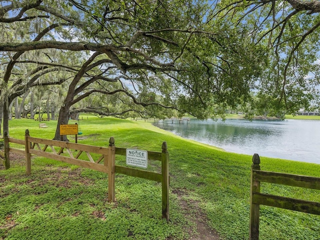 5110 Lake Valencia Blvd E, Palm Harbor, FL 34684 - view of community with a water view