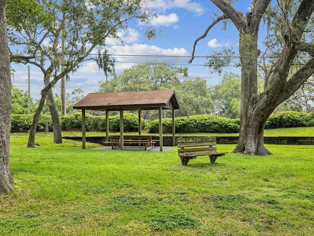 5110 Lake Valencia Blvd E, Palm Harbor, FL 34684 - view of property's community featuring a gazebo and a yard