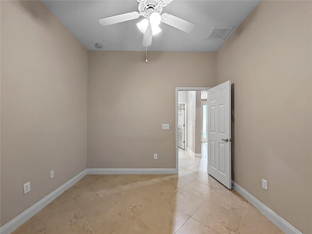 2802 Devonoak Blvd, Land O Lakes, FL 34638 - spare room with a ceiling fan and light tile patterned flooring