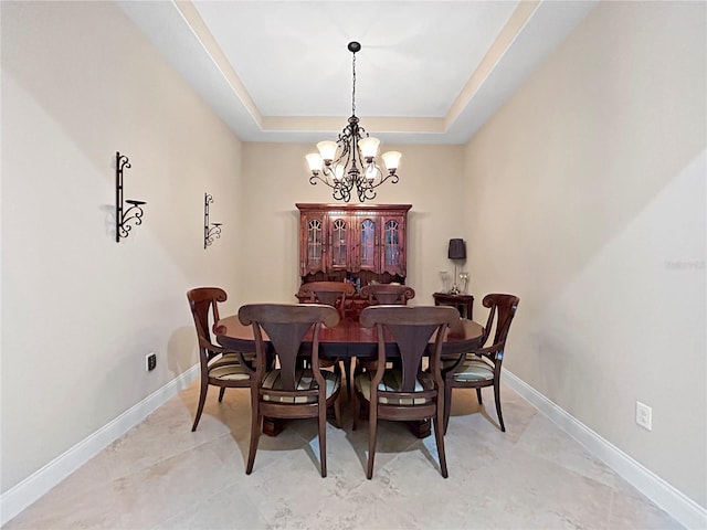 2802 Devonoak Blvd, Land O Lakes, FL 34638 - dining room featuring a chandelier and a raised ceiling