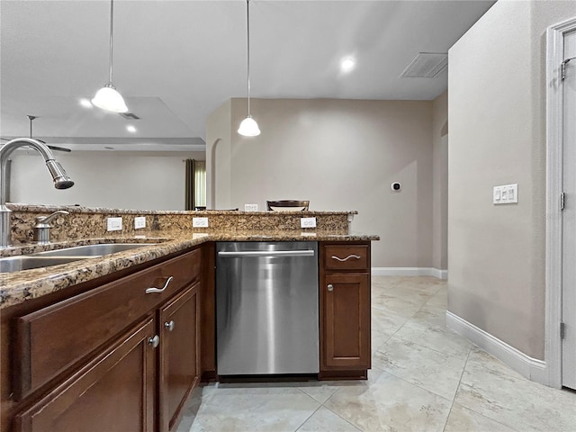 2802 Devonoak Blvd, Land O Lakes, FL 34638 - kitchen with dishwasher, dark stone counters, hanging light fixtures, and dark brown cabinetry