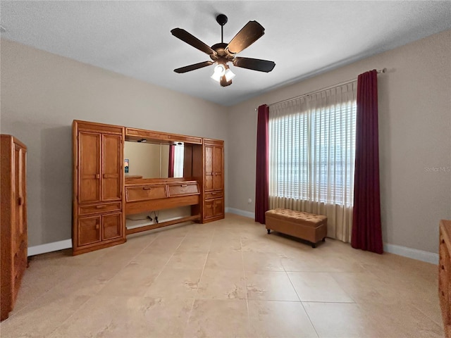 2802 Devonoak Blvd, Land O Lakes, FL 34638 - unfurnished room with a ceiling fan and light tile patterned floors