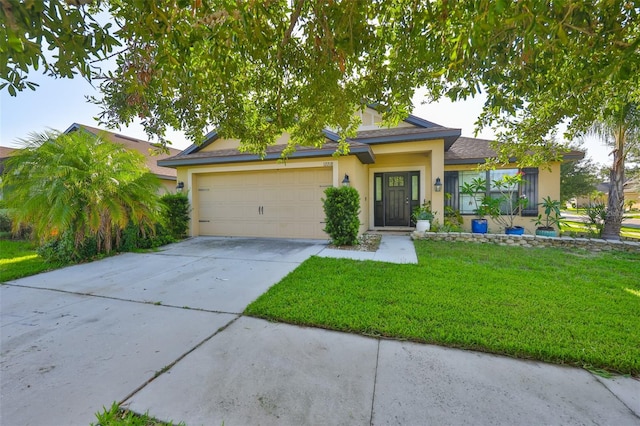 12218 Avondale Oak Pl, Riverview, FL 33578 - view of front facade with stucco siding, an attached garage, driveway, and a front yard