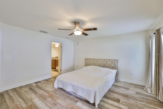 12218 Avondale Oak Pl, Riverview, FL 33578 - bedroom featuring light wood-type flooring, ceiling fan, and ensuite bath