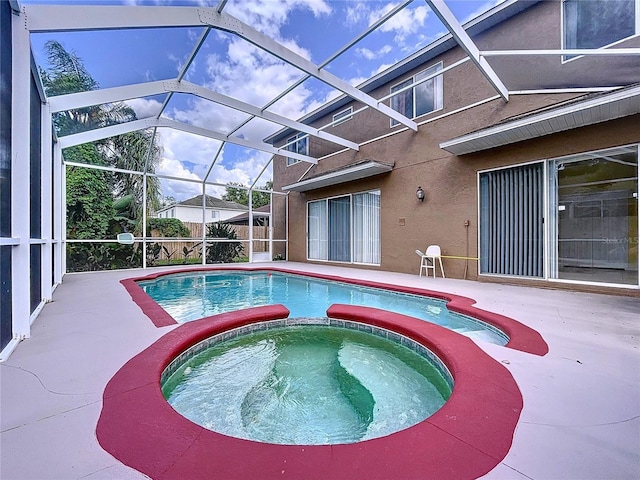4222 Trumpworth Ct, Valrico, FL 33596 - view of pool with a pool with connected hot tub, a patio, and a lanai