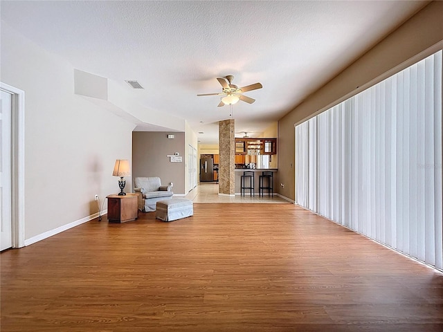 4222 Trumpworth Ct, Valrico, FL 33596 - living room with wood finished floors and ceiling fan