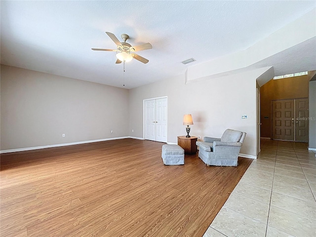 4222 Trumpworth Ct, Valrico, FL 33596 - sitting room with a ceiling fan and wood finished floors