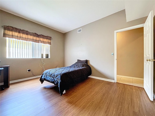 4222 Trumpworth Ct, Valrico, FL 33596 - bedroom with wood finished floors and baseboards