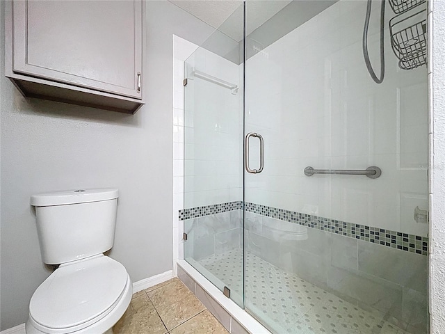 4222 Trumpworth Ct, Valrico, FL 33596 - bathroom with a stall shower and tile patterned flooring