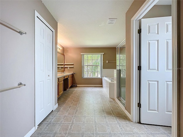 4222 Trumpworth Ct, Valrico, FL 33596 - full bathroom featuring vanity, a bath, and a shower stall