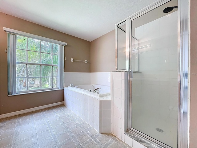 4222 Trumpworth Ct, Valrico, FL 33596 - full bathroom featuring a shower stall, a bath, and tile patterned floors