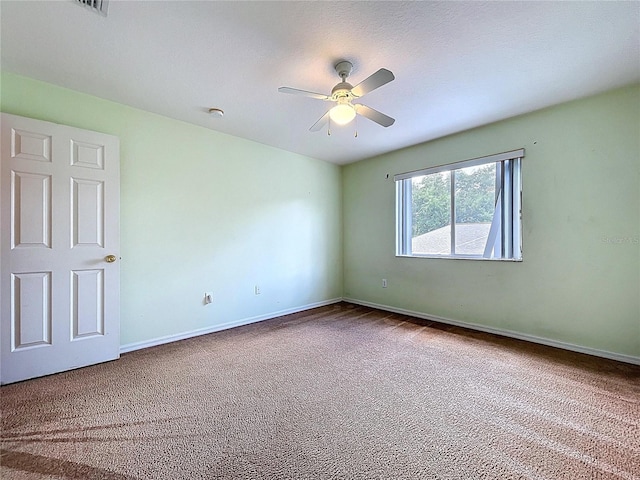 4222 Trumpworth Ct, Valrico, FL 33596 - carpeted spare room with a ceiling fan and a smoke detector