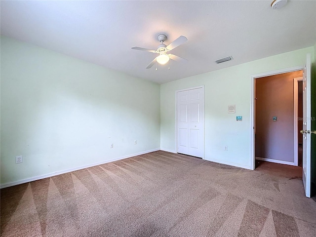 4222 Trumpworth Ct, Valrico, FL 33596 - unfurnished bedroom featuring carpet flooring, a closet, and a ceiling fan