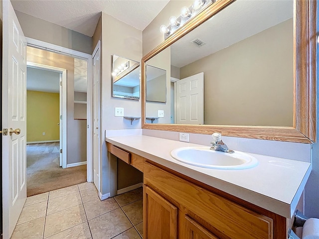 4222 Trumpworth Ct, Valrico, FL 33596 - bathroom featuring vanity and tile patterned floors