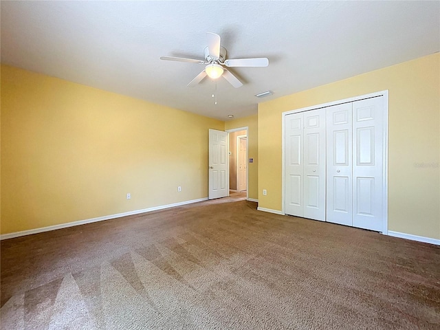 4222 Trumpworth Ct, Valrico, FL 33596 - unfurnished bedroom with carpet, ceiling fan, and a closet