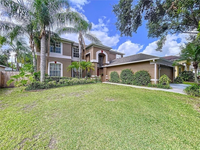 4222 Trumpworth Ct, Valrico, FL 33596 - view of front facade featuring stucco siding, a garage, and concrete driveway