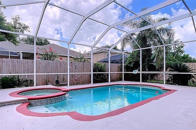 4222 Trumpworth Ct, Valrico, FL 33596 - view of swimming pool featuring a patio area, a pool with connected hot tub, and a lanai