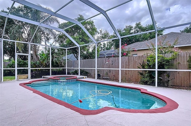 4222 Trumpworth Ct, Valrico, FL 33596 - view of pool with a fenced backyard, a pool with connected hot tub, a patio, and glass enclosure
