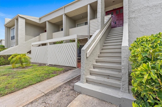 630 Windrush Bay Dr Unit 630, Tarpon Springs, FL 34689 - exterior space with stucco siding