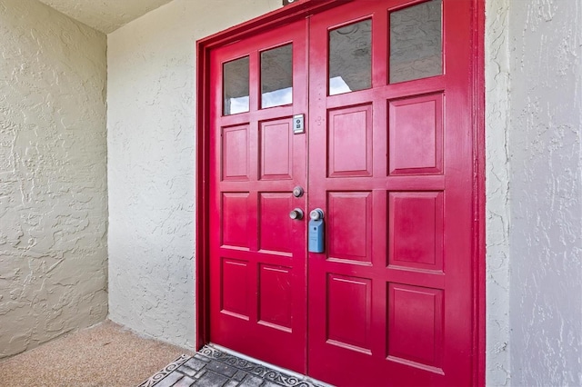 630 Windrush Bay Dr Unit 630, Tarpon Springs, FL 34689 - entrance to property featuring stucco siding