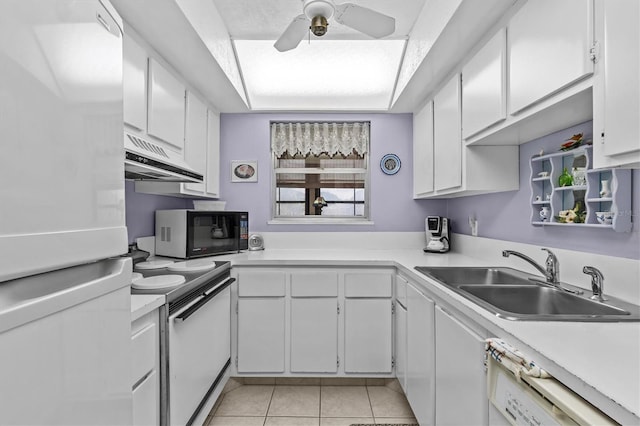 630 Windrush Bay Dr Unit 630, Tarpon Springs, FL 34689 - kitchen with white appliances, custom exhaust hood, light countertops, white cabinetry, and a ceiling fan