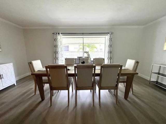 3856 Tarpon Rd, Venice, FL 34293 - dining area featuring wood finished floors and crown molding