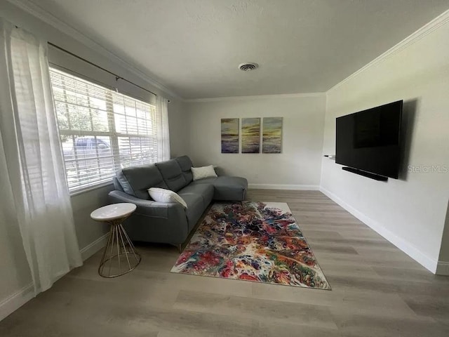 3856 Tarpon Rd, Venice, FL 34293 - living area featuring crown molding and wood finished floors