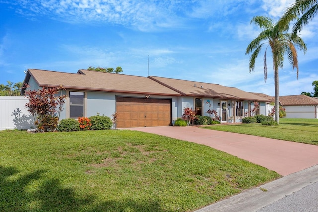 3302 69th St W, Bradenton, FL 34209 - single story home featuring a garage, driveway, a front yard, and stucco siding
