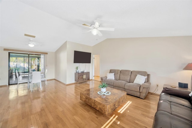 3302 69th St W, Bradenton, FL 34209 - living area with ceiling fan, vaulted ceiling, and light wood-style floors
