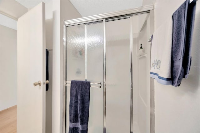 3302 69th St W, Bradenton, FL 34209 - full bath featuring a shower stall and wood finished floors