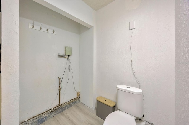 3302 69th St W, Bradenton, FL 34209 - bathroom with wood finished floors and toilet