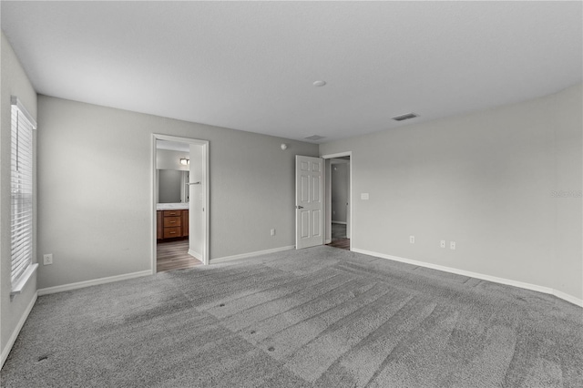 11958 Stone Pine St, Riverview, FL 33569 - unfurnished bedroom with carpet floors and connected bathroom