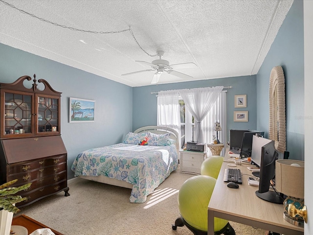 464 N Paula Dr Unit 106, Dunedin, FL 34698 - carpeted bedroom with an office area, a textured ceiling, and ceiling fan